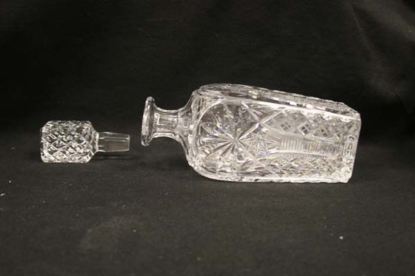 Cut glass decanter after repair