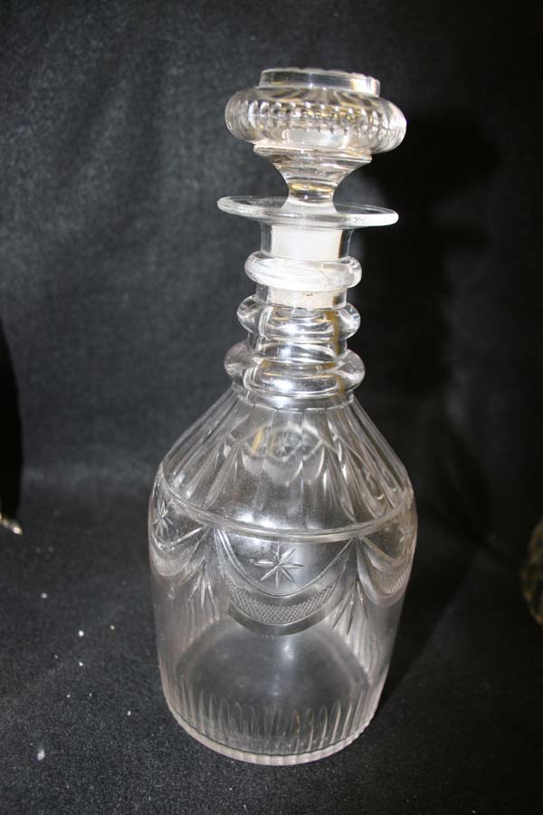 Fit the stopper in the antique decanter