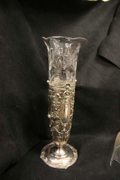 Repaired cut glass glass vase in silver foot