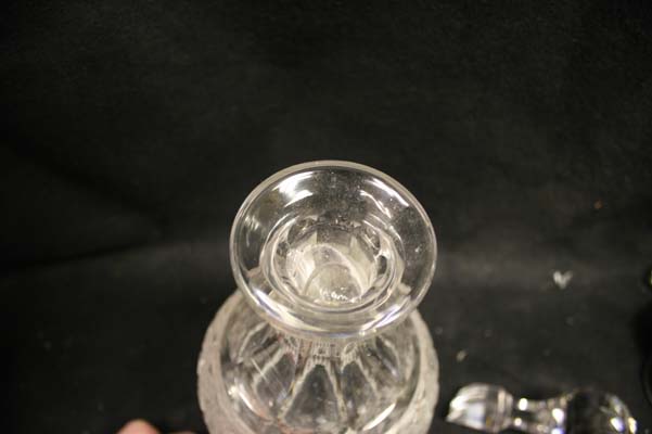 crystal decanter with broken stopper