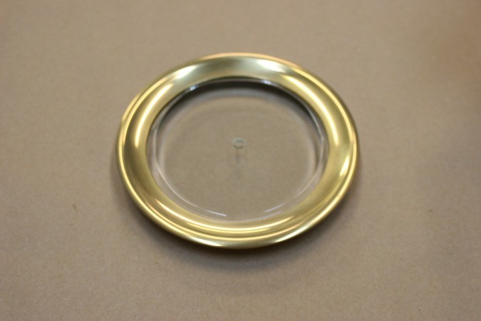 brass bezel with glass